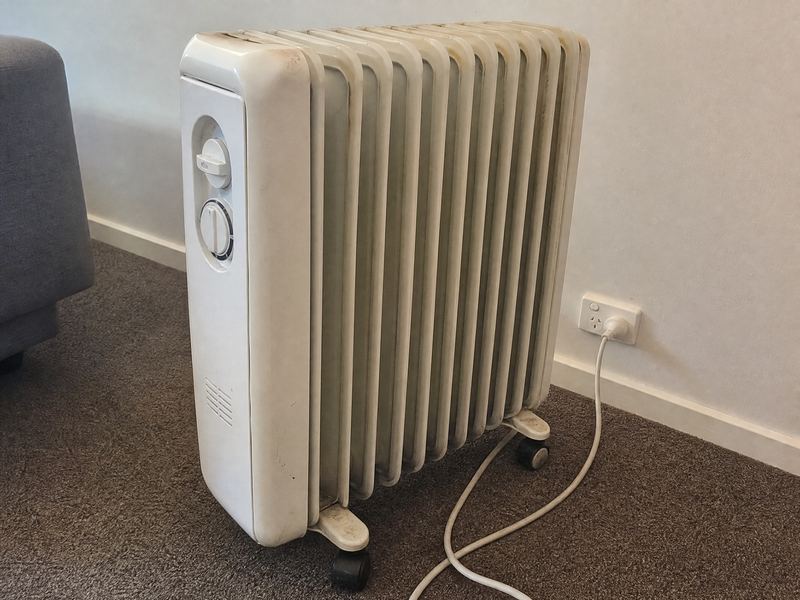 Portable heater, oil column